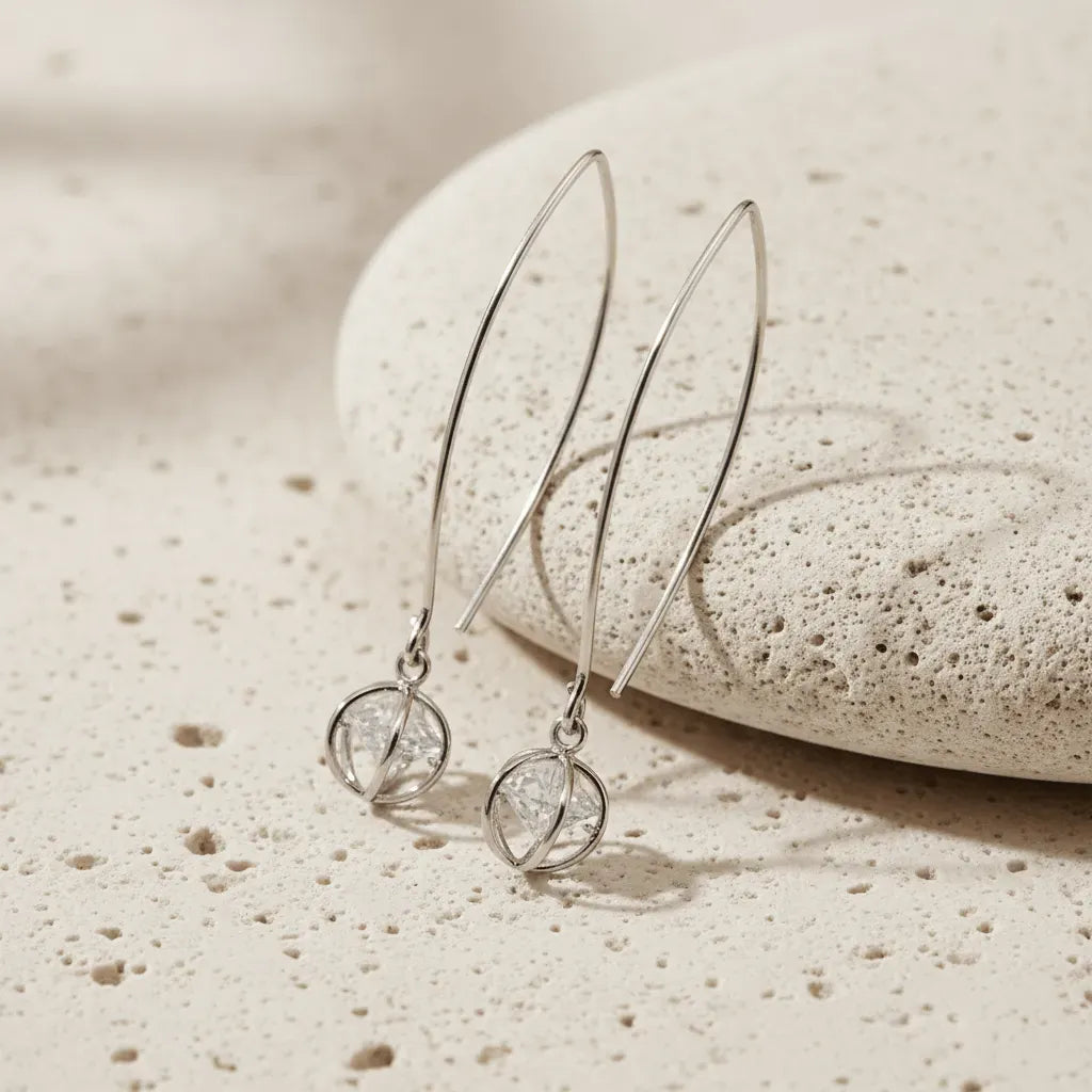 Pair of gold hoop earrings on a white background