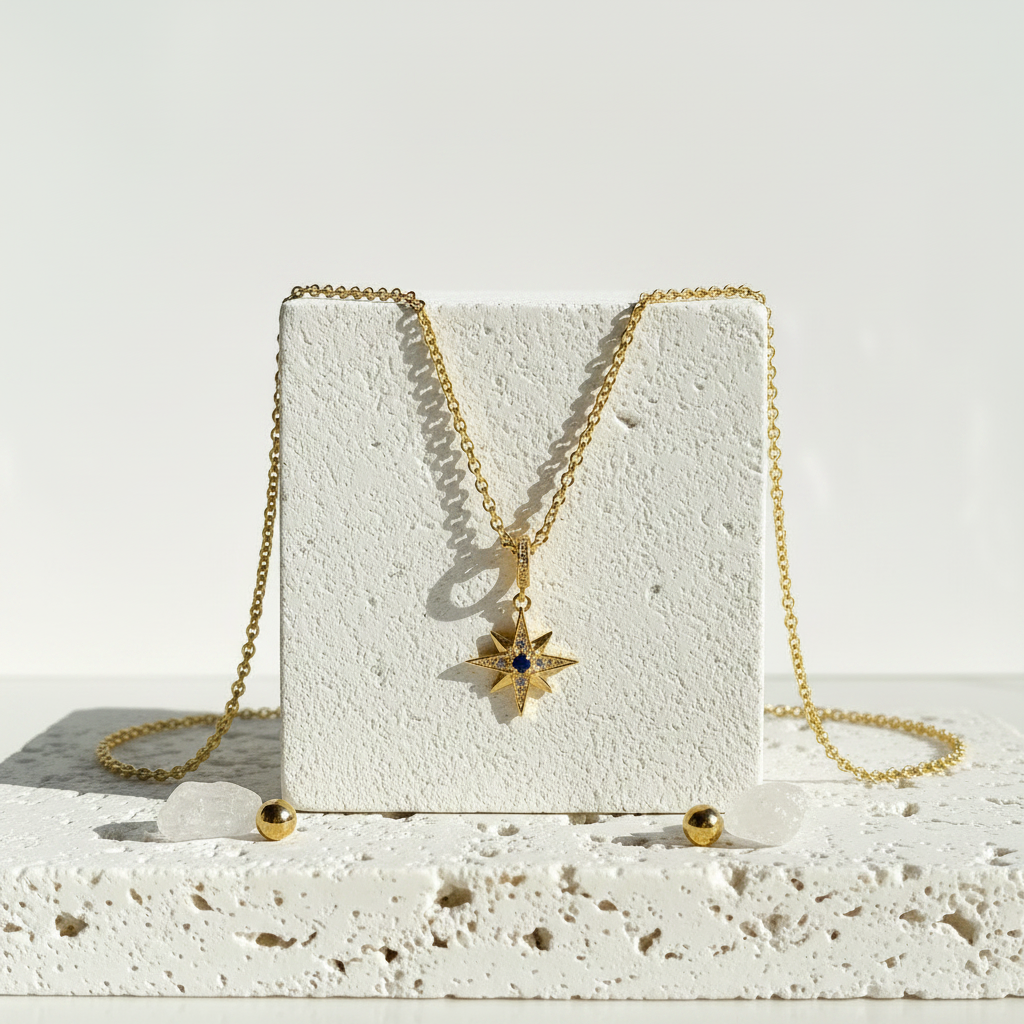 25mm crystal star pendant with blue crystal centre in gold plated sterling silver