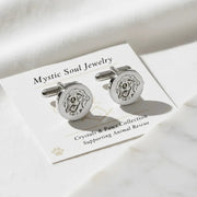 Silver cufflinks with a dog design on a card from Mystic Soul Jewelry