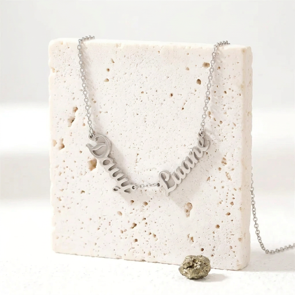 Silver custom name necklace with two script names linked on one chain