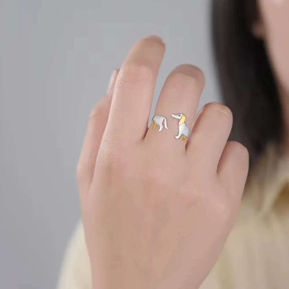 dog ring in silver on hand