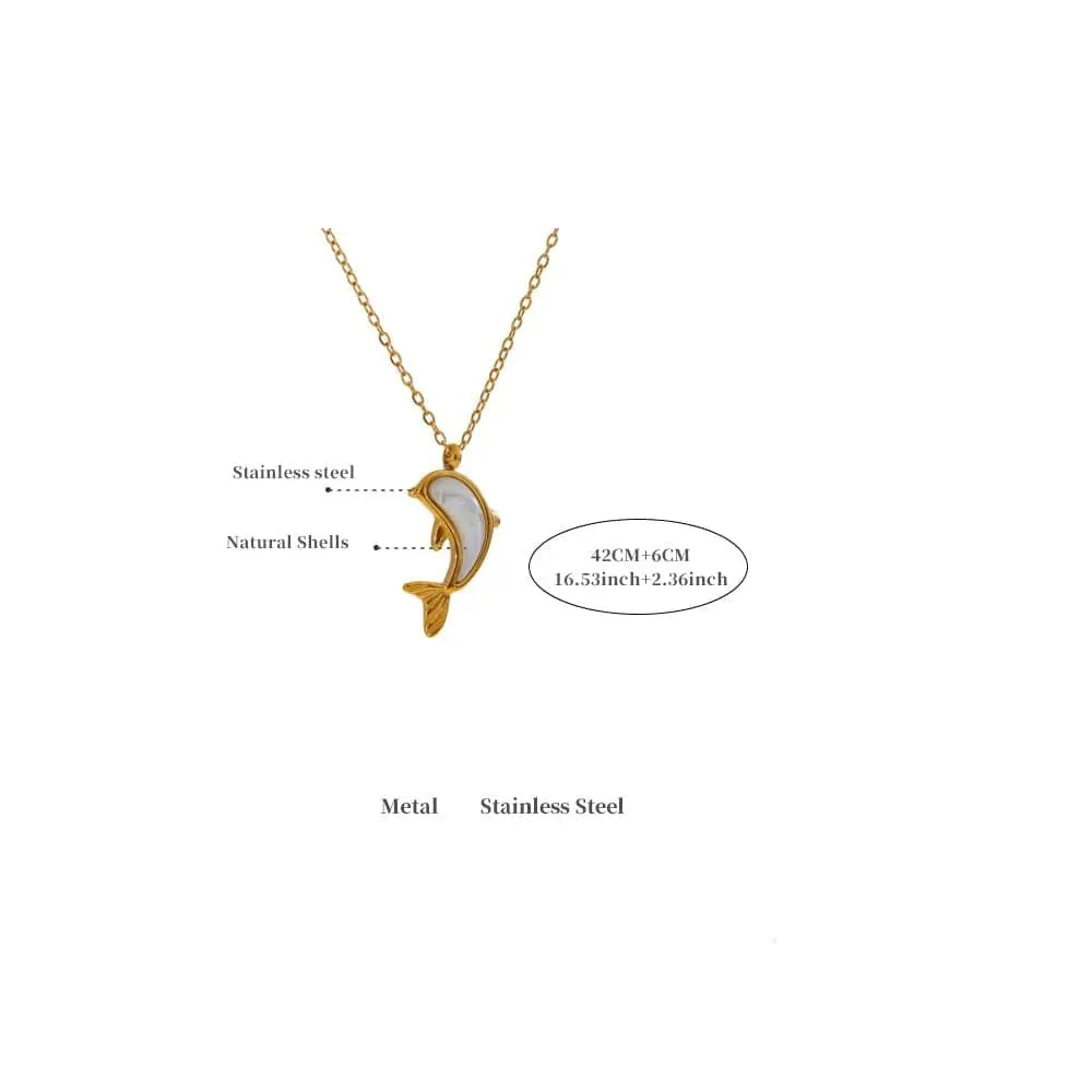Gold necklace with dolphin pendant on a white background