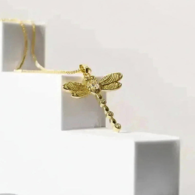 Gold dragonfly and heart locket necklaces — spirit animal jewelry for transformation