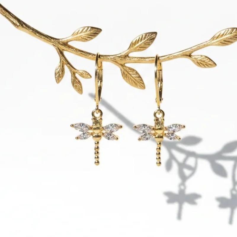 Dragonfly leverback earrings with clear and red crystal detail in gold plate
