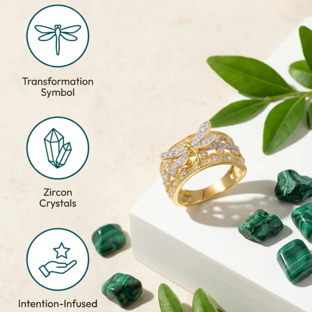 Gold ring with zircon crystals on a beige background with green stones and leaves.