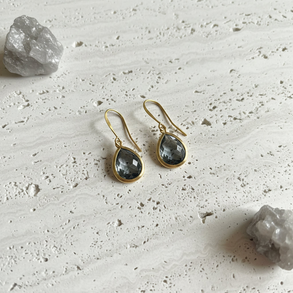 Dusk smoky grey faceted glass drop earrings in gold plated brass