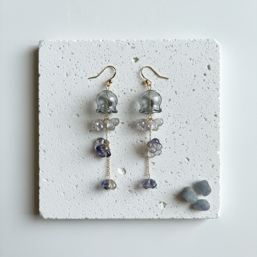 Dusk grey glass jellyfish earrings with gold cascading florets