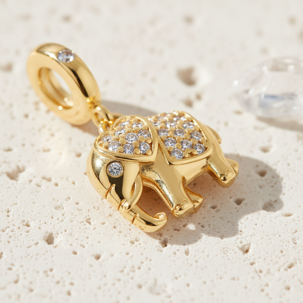 Gold-plated 925 sterling silver elephant charm pendant with a cubic zirconia accent — spirit animal jewellery