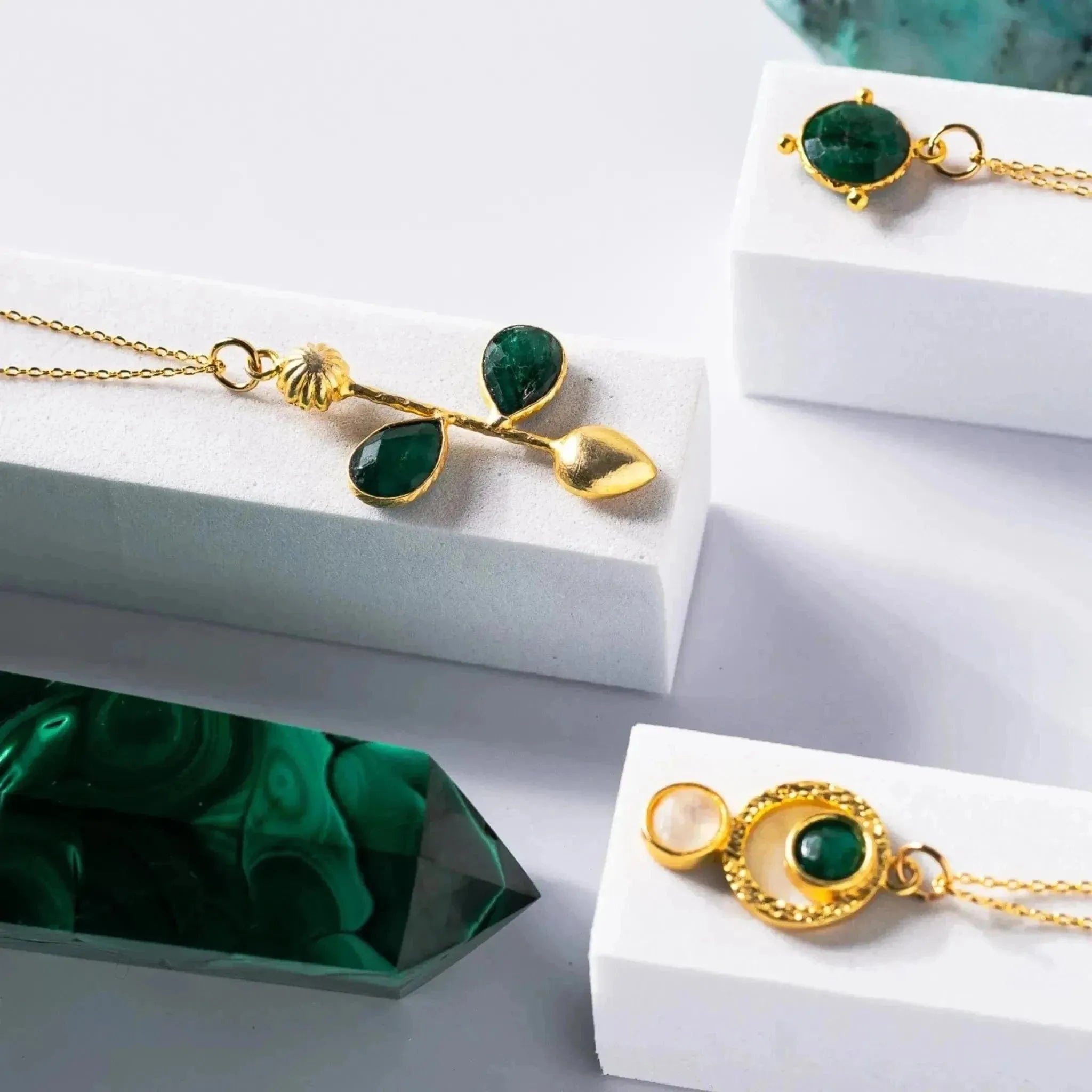 Gold-plated pendant necklace and matching earrings featuring brushed sacred geometry-inspired circle