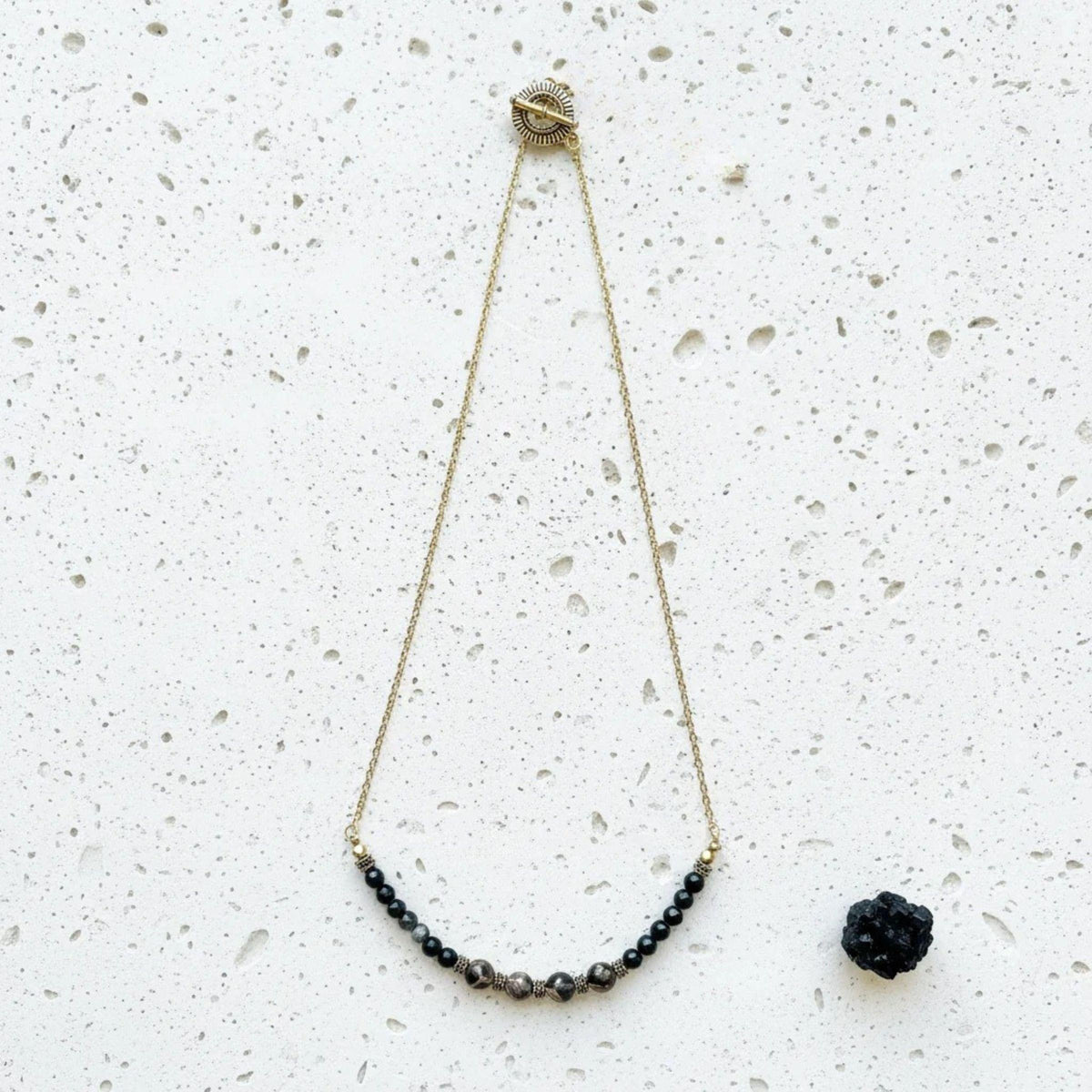 Etched agate dzi-style necklace with onyx and fair trade brass — one-of-a-kind jewelry for grounding