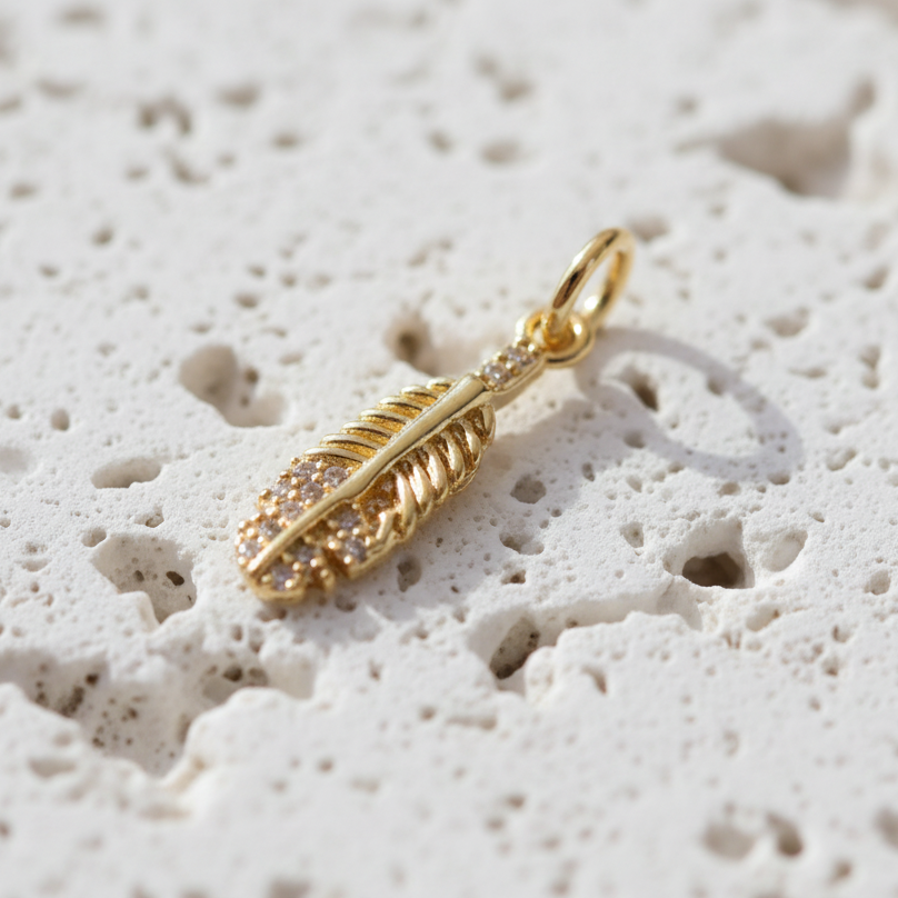 Gold plated feather charm for crystal bracelets — symbol of freedom and lightness