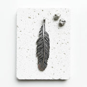 Black feather pendant in blackened 925 sterling silver — air element jewellery for transformation