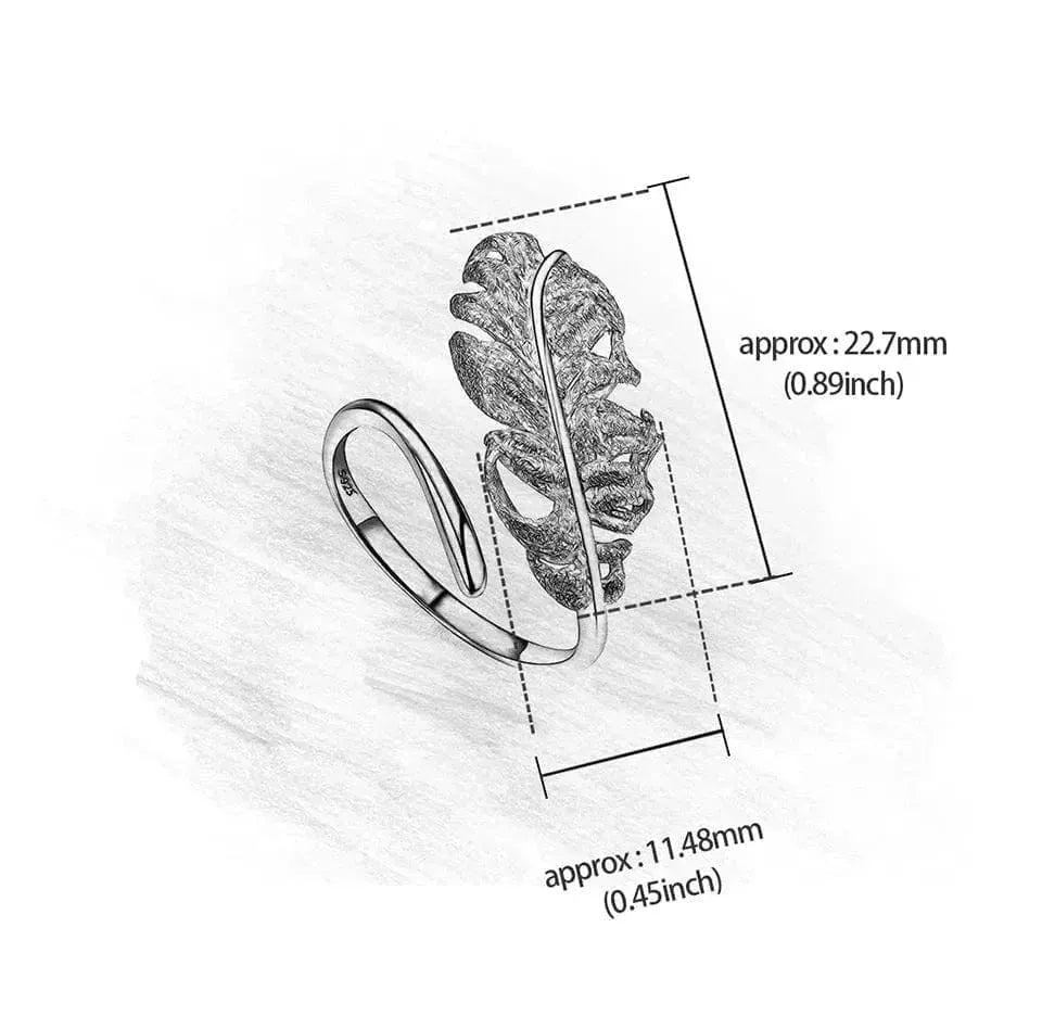 Silver ring with feather design and measurement details on a white background