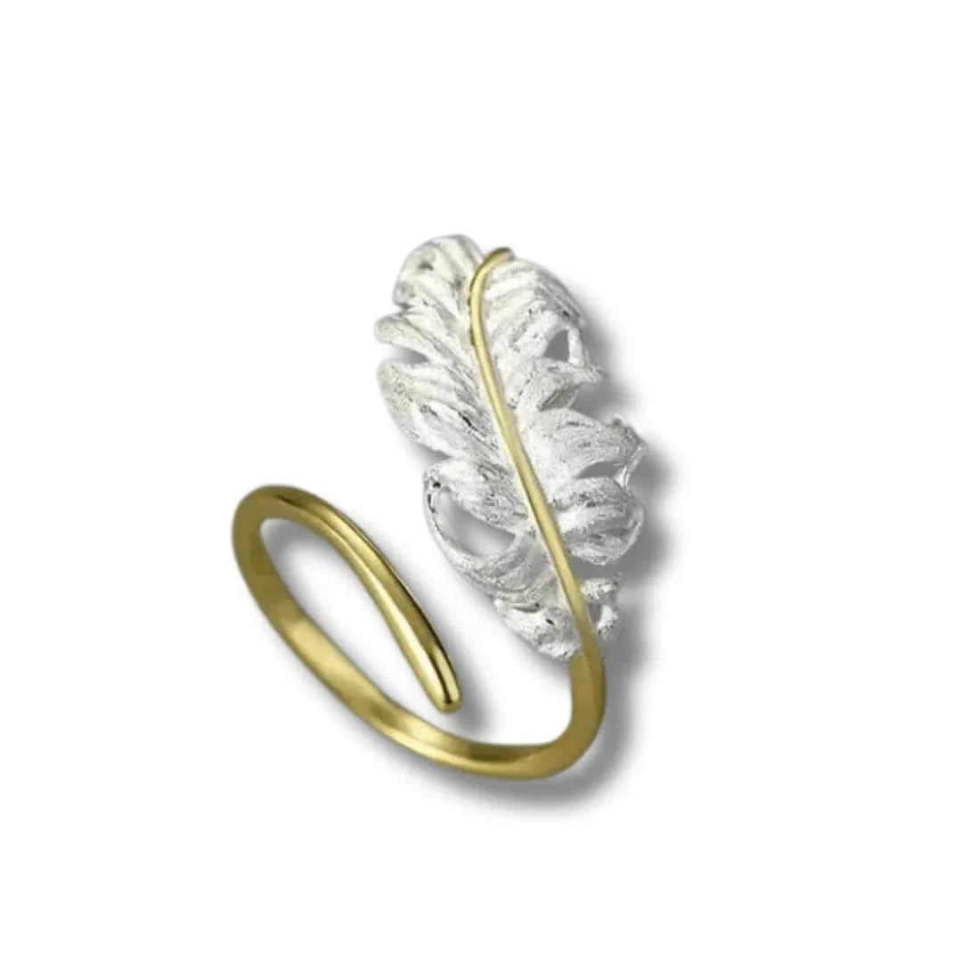 Set of blue teardrop earrings with gold hooks on a white textured surface