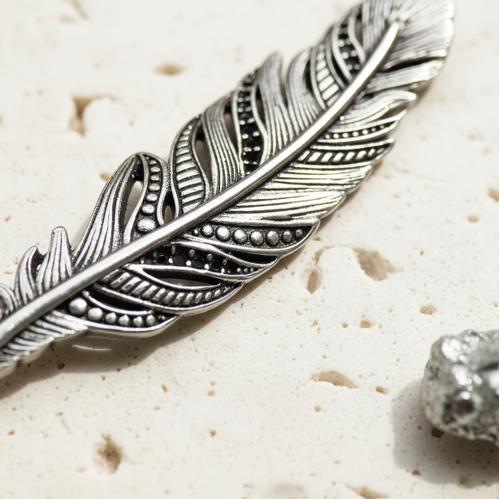 Blackened sterling silver feather pendant, 55 mm detail — air element jewellery for transformation