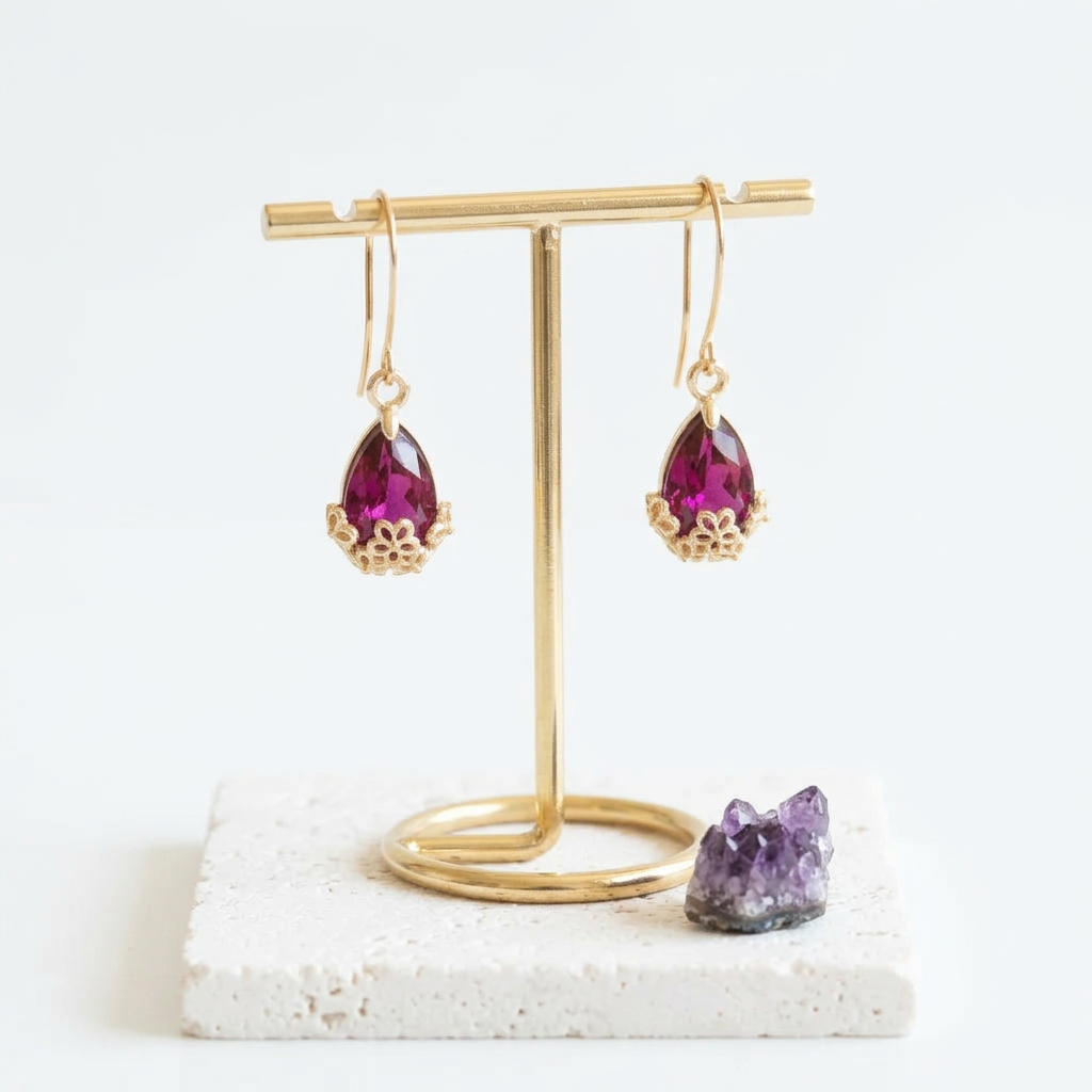Large gold Flower-Cap earrings with rich fuchsia pink glass drops, hanging view