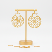 Gold flower of life saddle hoop earrings hanging — sacred geometry jewelry for balance