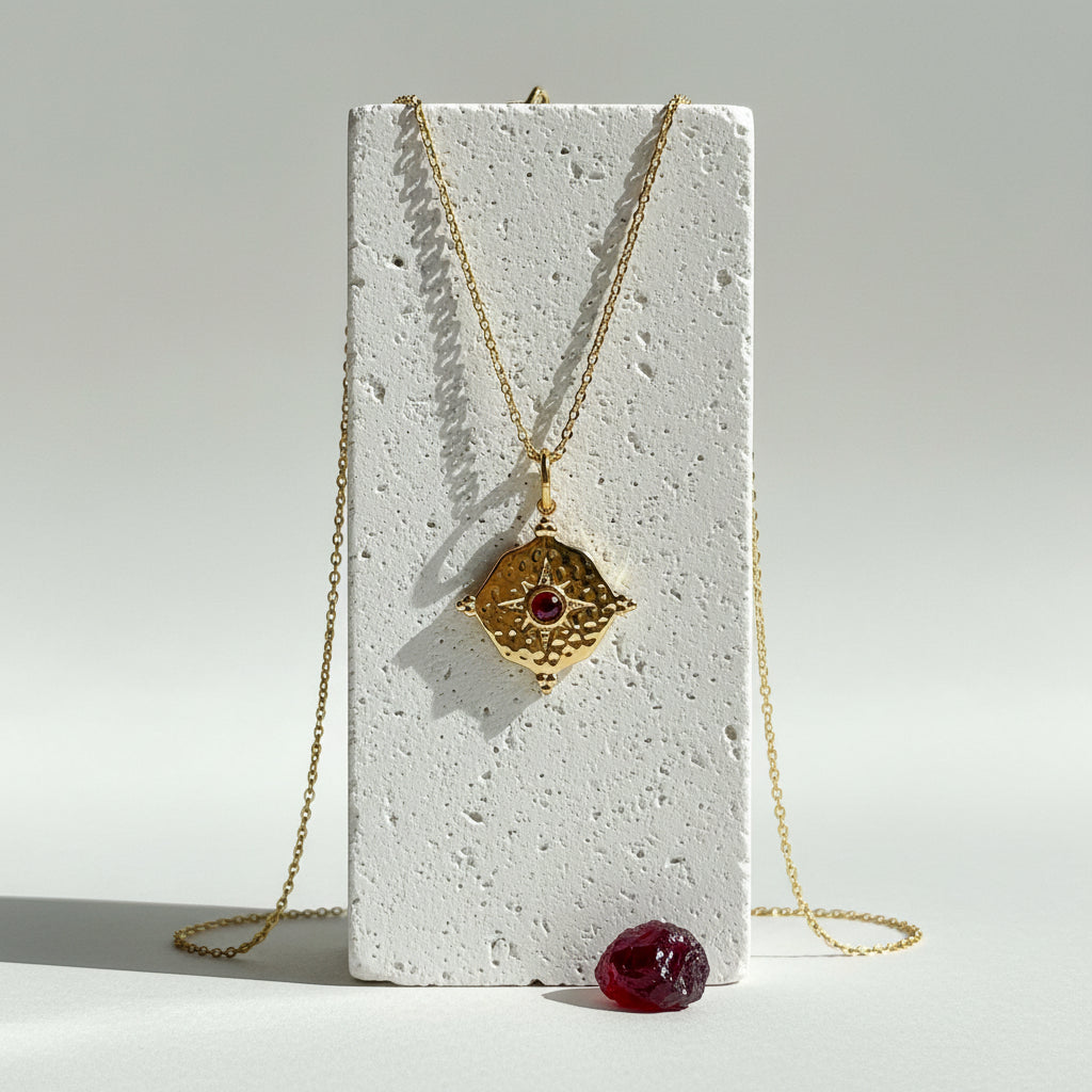 Gold hammered medallion necklace with deep red garnet CZ centre, January and July birthstone jewelry