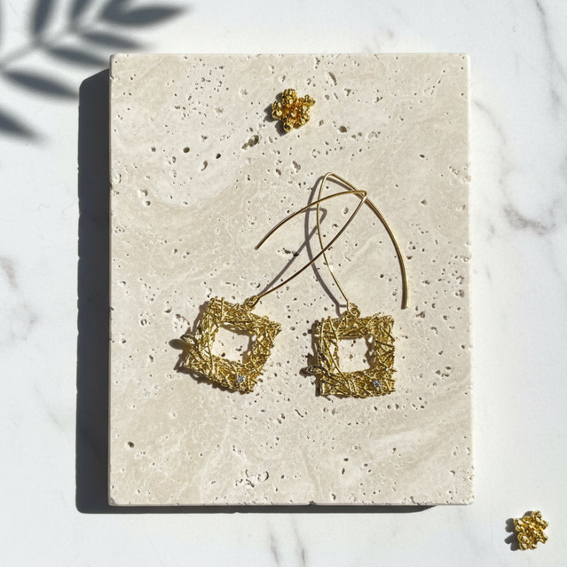 Gold plated square cut-out long drop earrings with bird and small crystal, sacred geometry jewelry