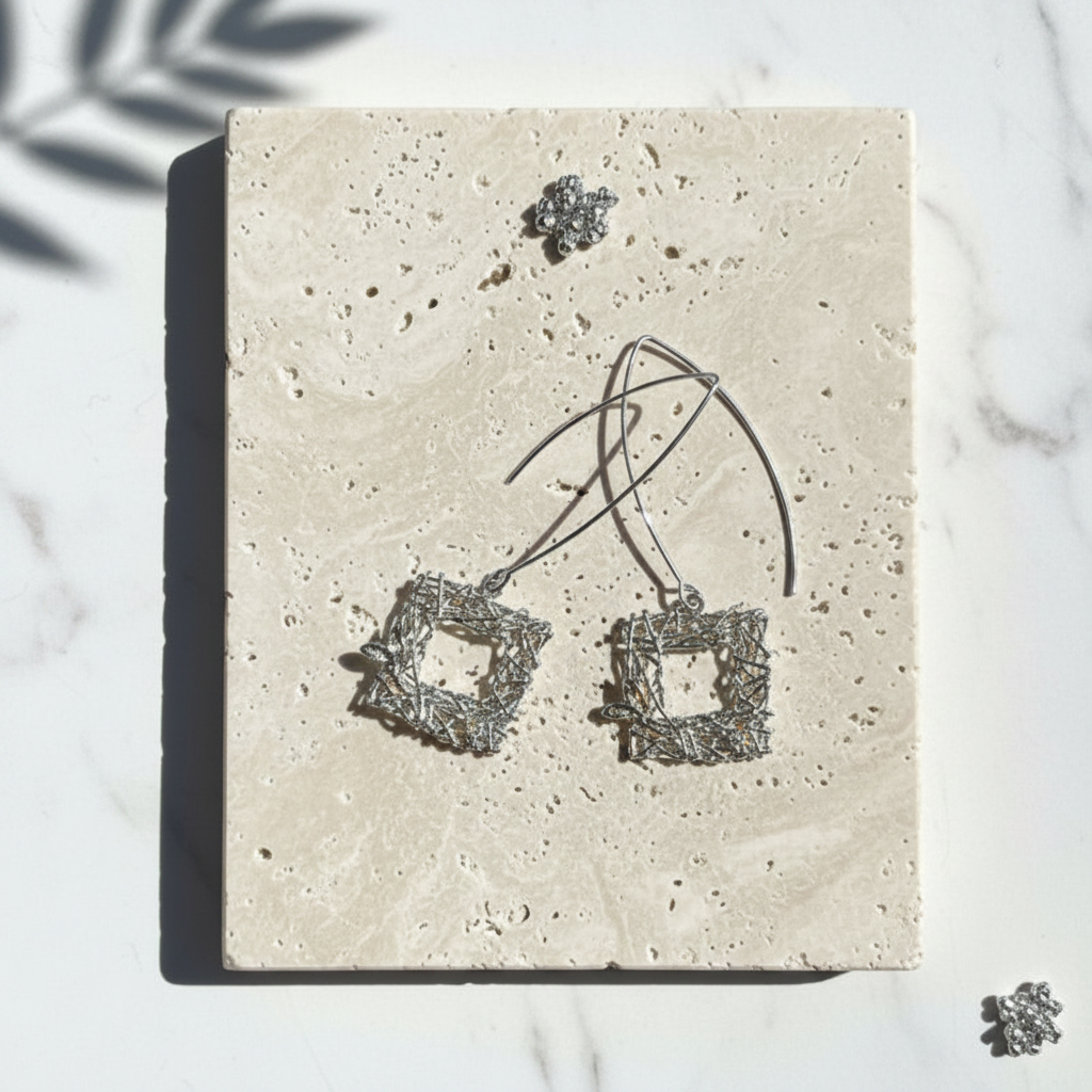 Silver plated bird cut-out square long drop earrings with small crystal accent
