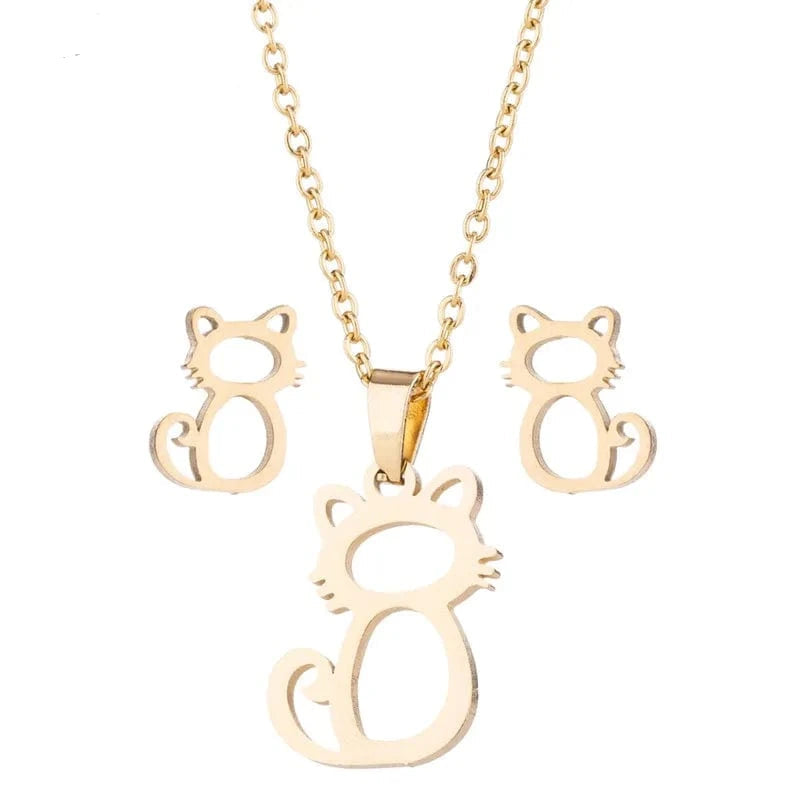 Gold cat-shaped necklace and earrings on a white background