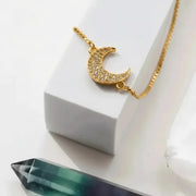 Gold crescent moon bracelet on a delicate chain, celestial jewelry