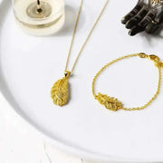 gold feather necklace bracelet