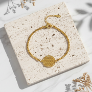 Gold flower of life charm bracelet on a link chain — sacred geometry jewelry for connection