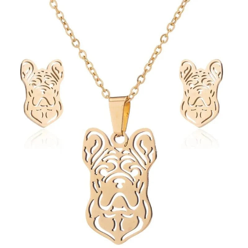 Gold bulldog pendant necklace with matching earrings on a white background