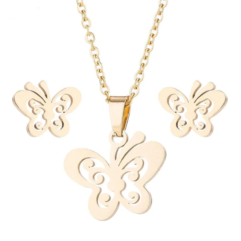 Gold butterfly necklace and earrings set on a white background