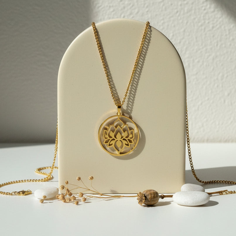 Gold lotus flower medallion necklace — spiritual symbol jewelry for renewal
