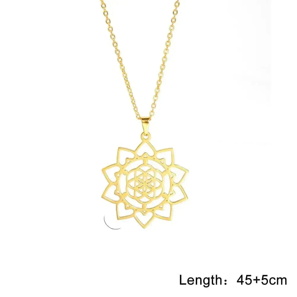 Gold necklace with a mandala pendant on a white background