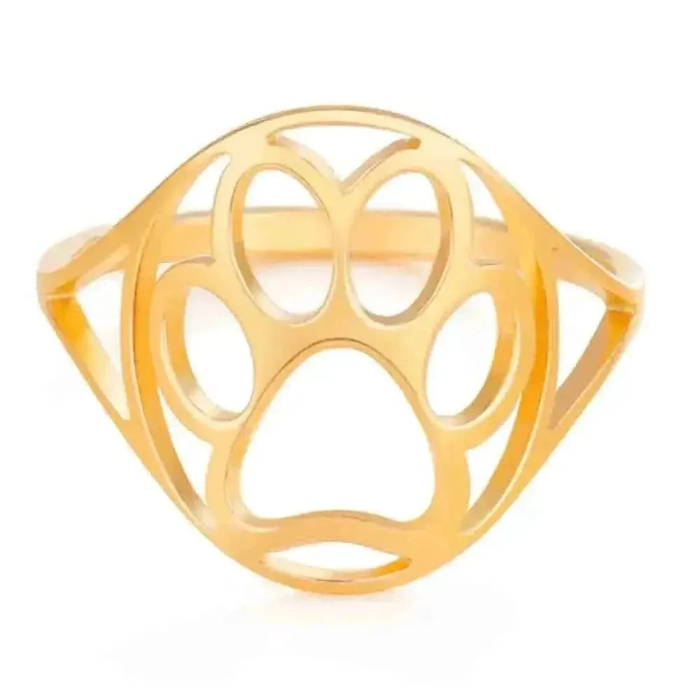 Gold ring with geometric design on a white background