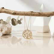Gold crystal tree of life necklace — spiritual symbol jewelry for grounding and growth