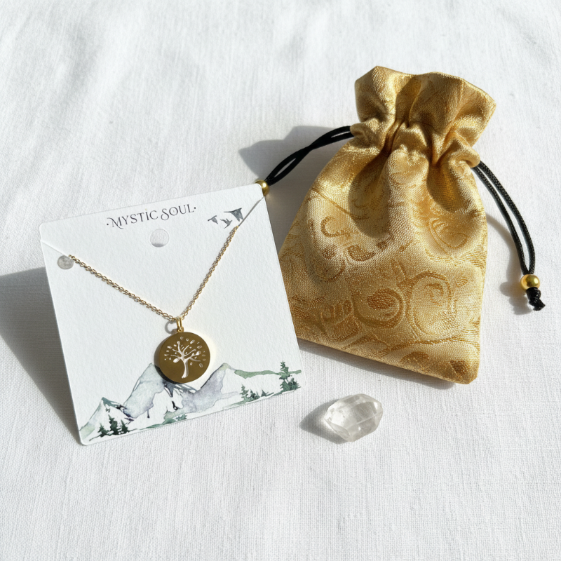 Gold tree of life medallion necklace on a Mystic Soul Jewelry card