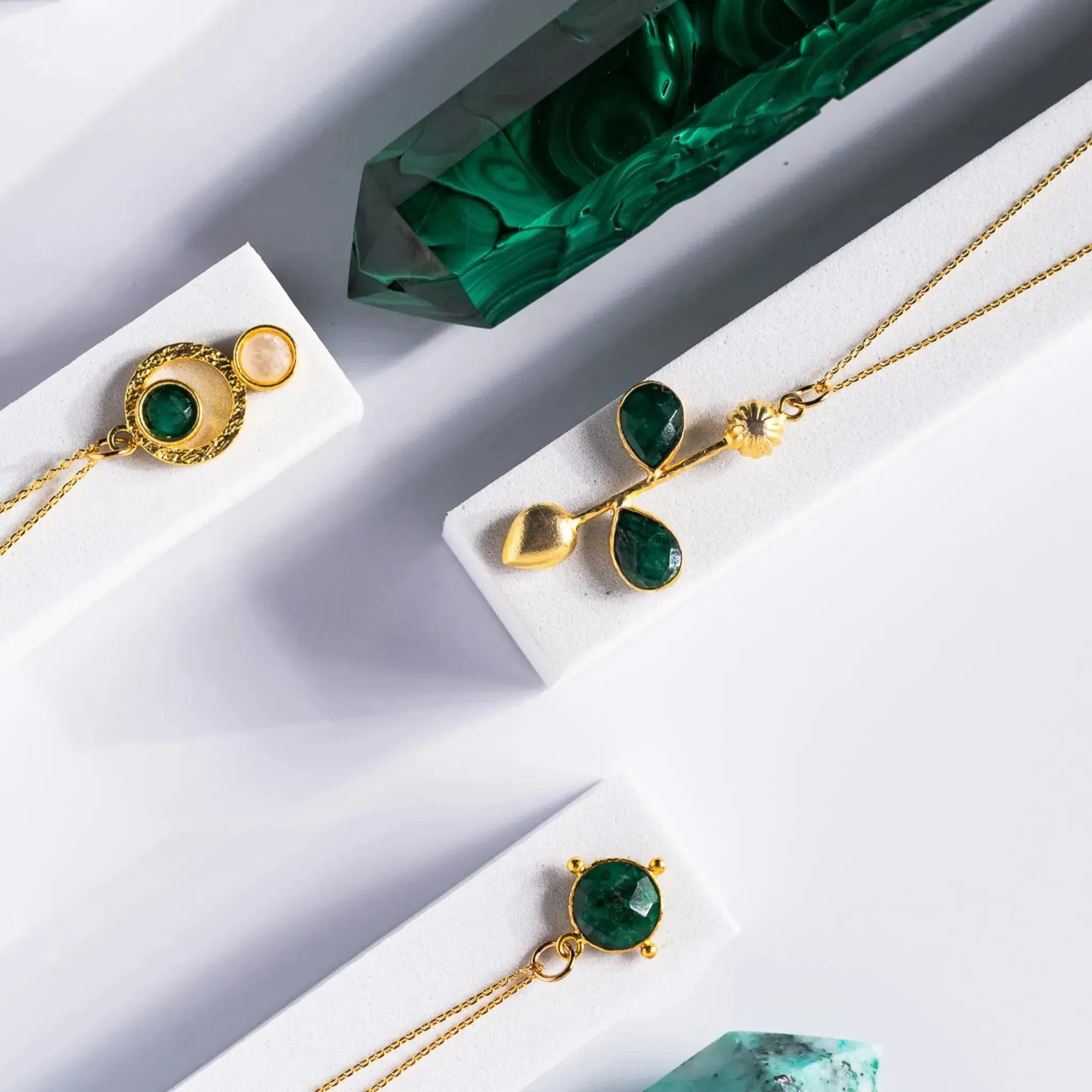 Gold-plated pendant necklace and matching earrings featuring brushed sacred geometry-inspired circle