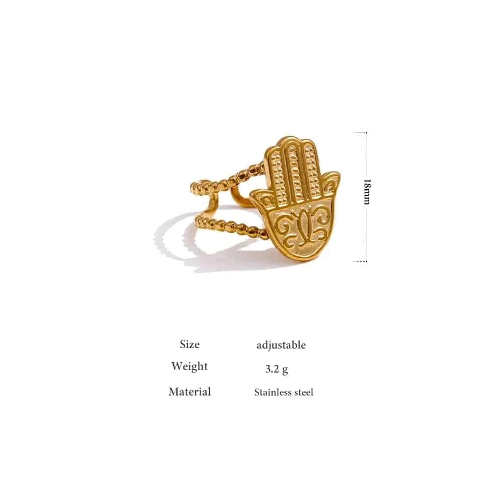Gold Hamsa hand ring with size, weight, material, and color information on a white background