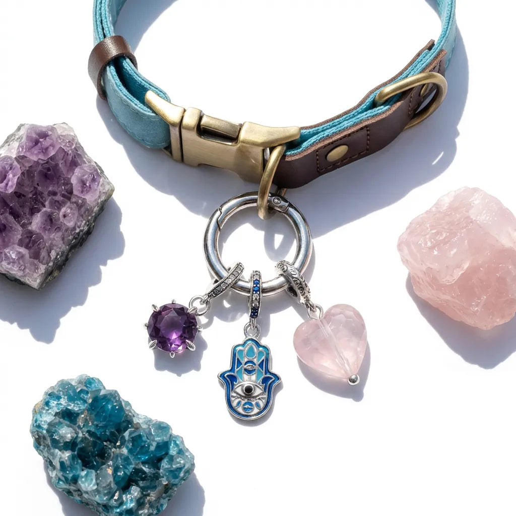 Dog collar with charm featuring crystals and gemstones on a white background
