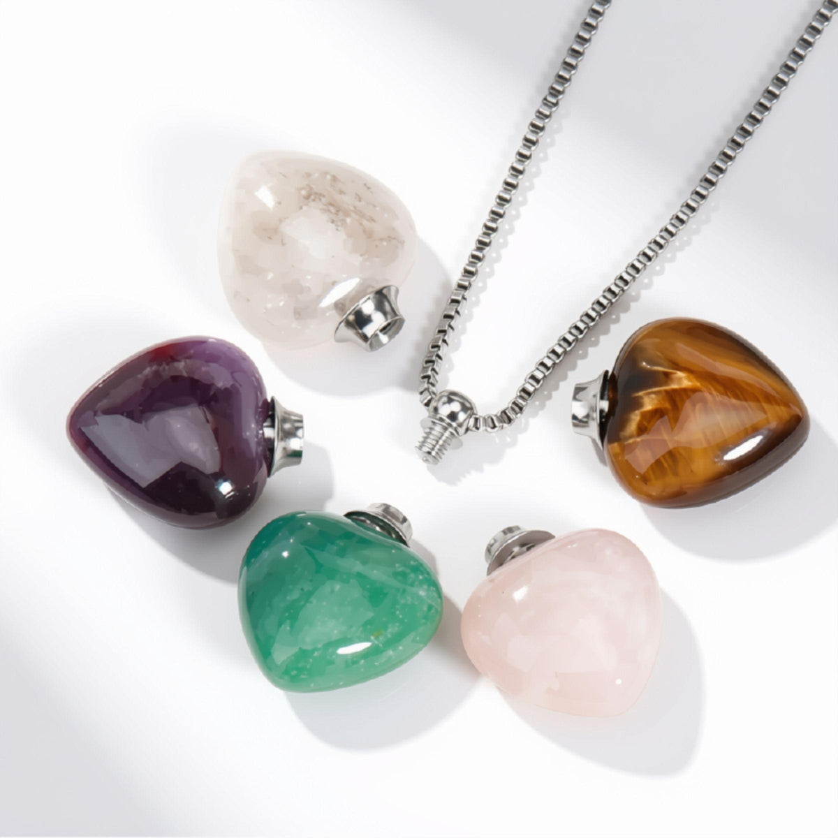 Heart vial diffuser pendants open to hold oil — heart chakra jewelry for love and calm