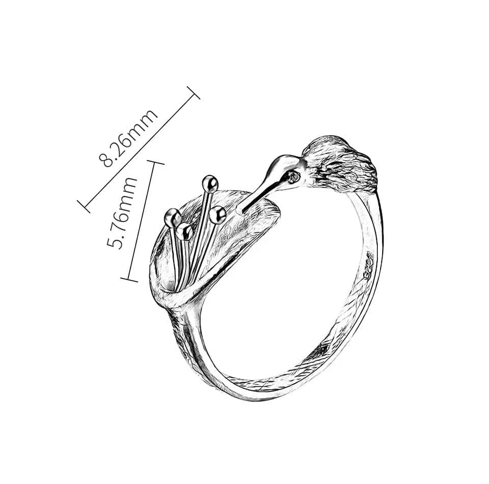 Silver ring with measurements on a white background