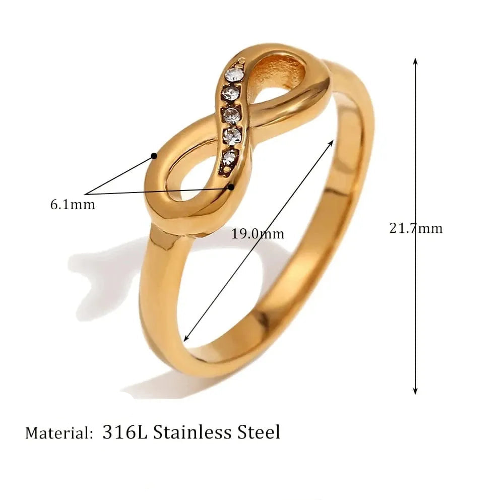 Gold ring with measurements and material details on a white background