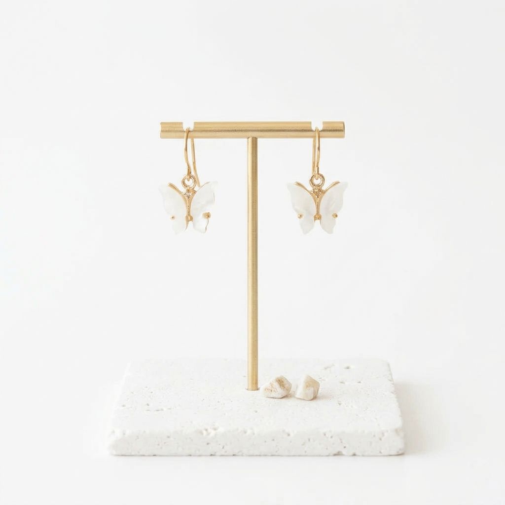 Gold ivory butterfly earrings, spirit animal jewellery for transformation