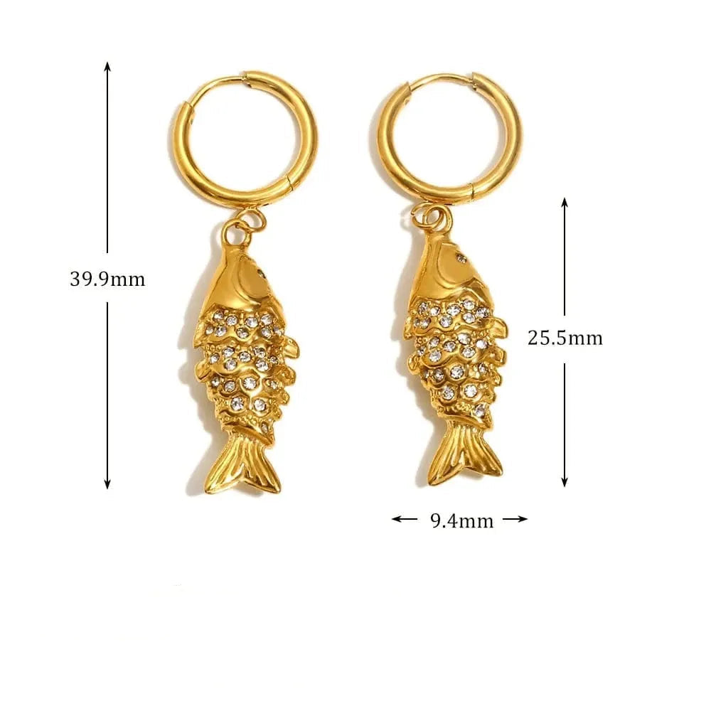 Gold fish-shaped earrings with measurements and material details on a white background