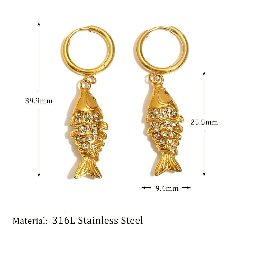 Gold fish-shaped earrings with measurements and material details on a white background