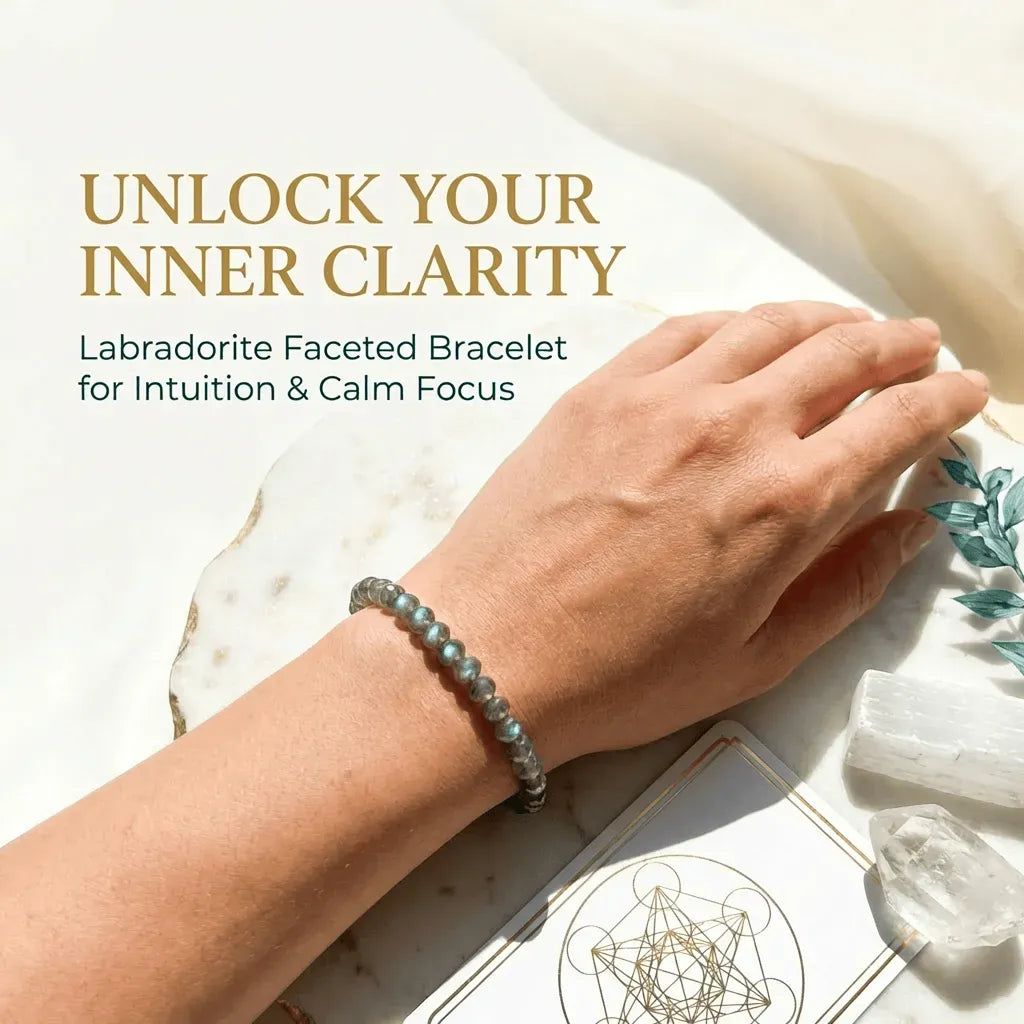 Hand wearing a Labradorite faceted bracelet with crystals and text on a light background