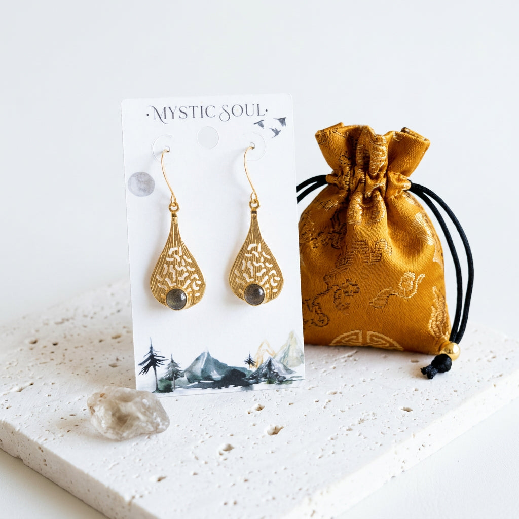 Filigree teardrop labradorite earrings on a Mystic Soul card with a mustard satin pouch