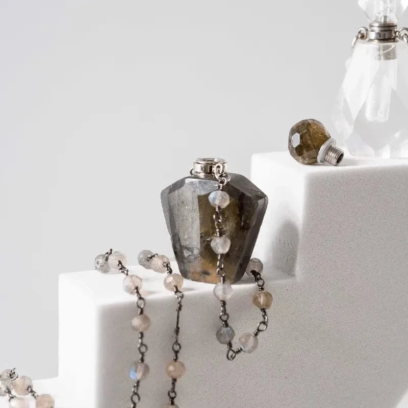 Decorative necklace with beads on a white surface