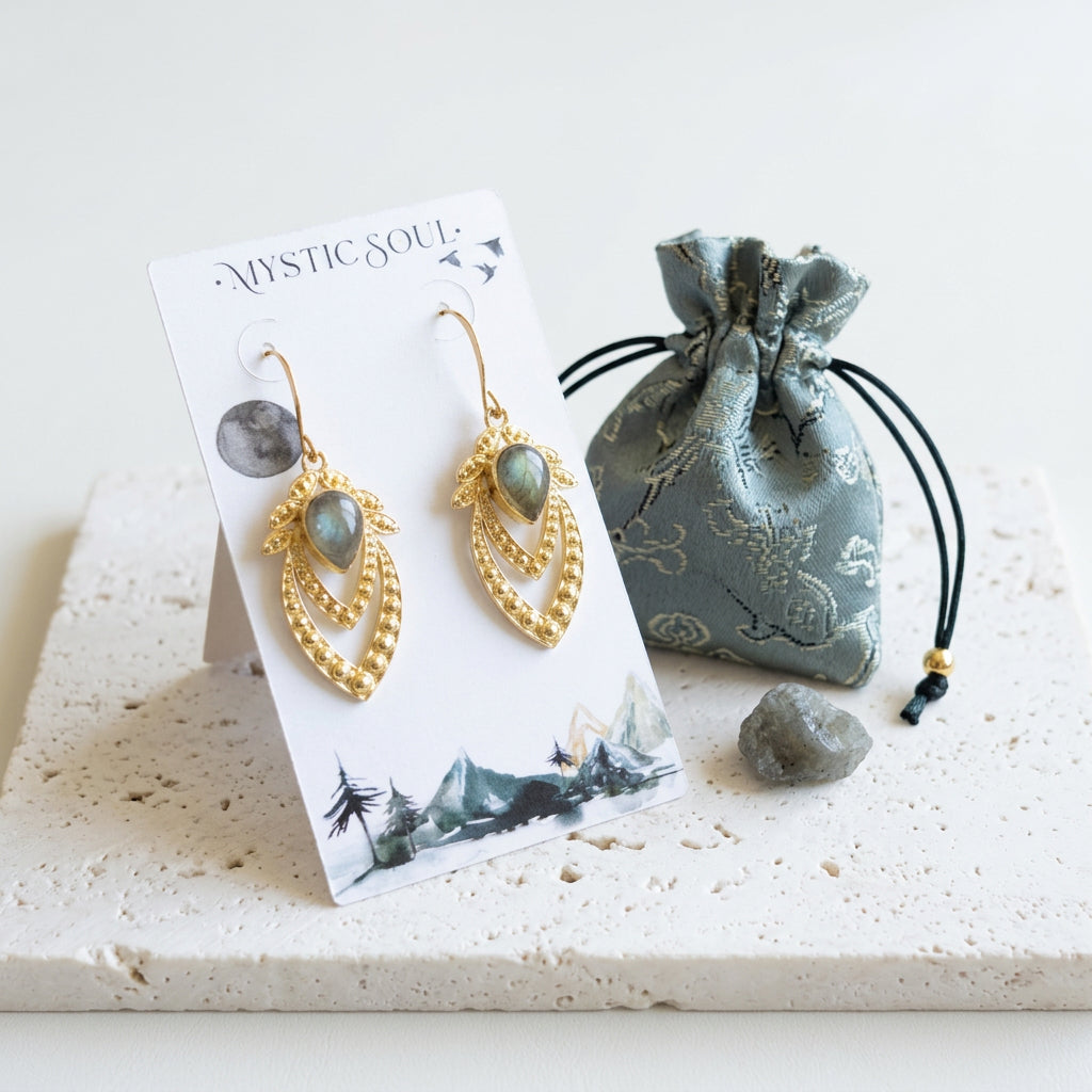 Ornate labradorite statement earrings on a Mystic Soul card with a sage satin pouch