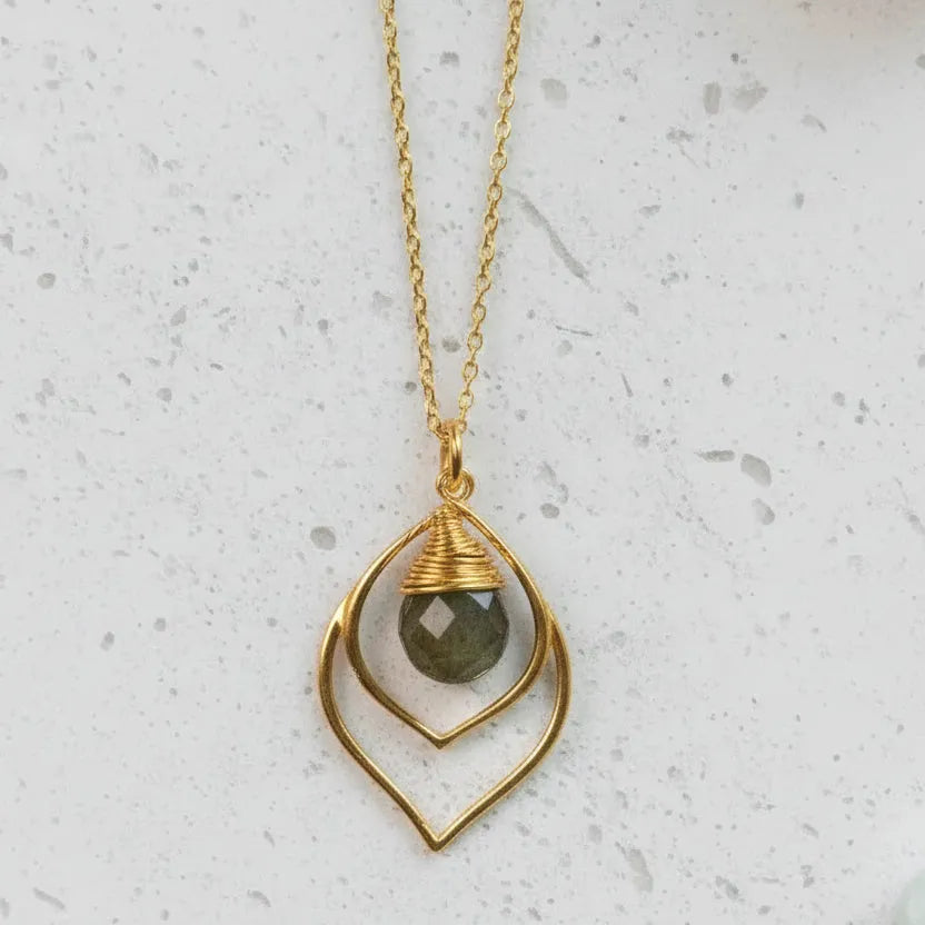 Silver necklace with a pendant on a white background