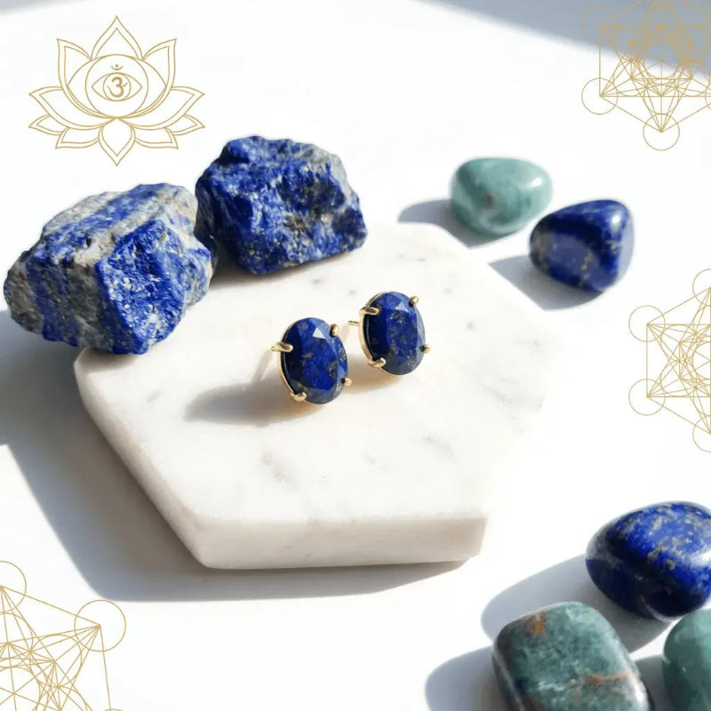 Lapis lazuli earrings with raw stones on a white background